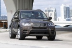 2013 BMW X5 xDrive50i in Sparkling Bronze Metallic - Driving Front Right View